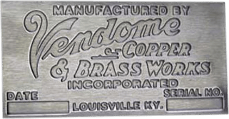 This metal nameplate, produced by Vendome Copper & Brass Works Incorporated of Louisville, Kentucky, features the company’s name and location prominently stamped into its durable surface. It includes blank fields labeled for "Date" and "Serial Number," intended to be filled in as needed to record manufacturing details. Designed for longevity and clarity, this sturdy nameplate serves to certify the authenticity of Vendome equipment while providing a reliable way to document key information for identification and tracking purposes.