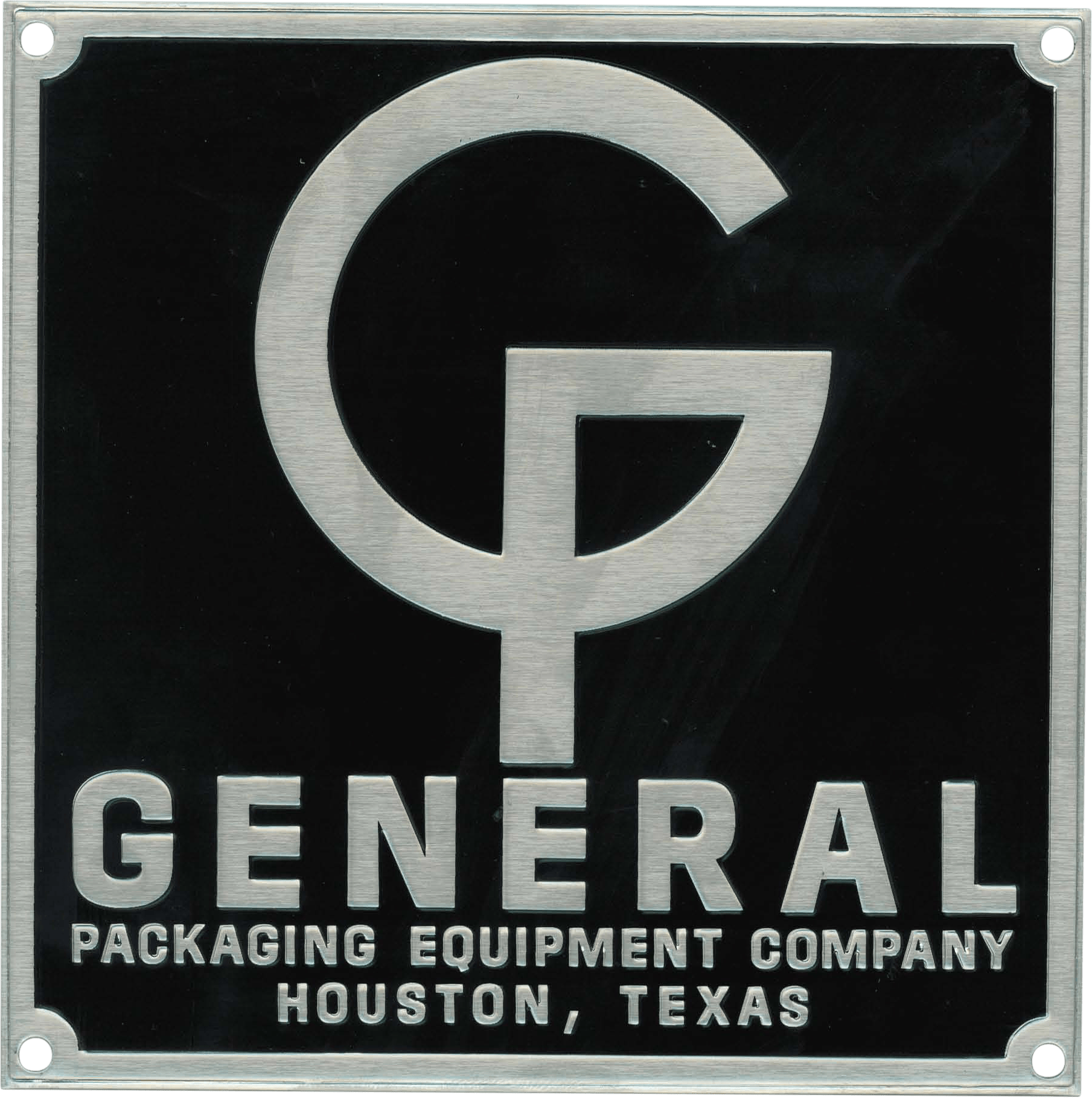 Certainly! Here's a description of the metal nameplate based on your information: The metal nameplate is a rectangular sign featuring a sleek, stylized "GP" logo prominently positioned at the top. Beneath the logo, the company name is clearly displayed in all capital letters: GENERAL PACKAGING EQUIPMENT COMPANY. Below this, "HOUSTON, TEXAS" indicates the company's location. The entire design is set against a solid black background, with contrasting lettering that ensures high visibility and readability. This professional-looking plate likely serves as an identification marker for equipment manufactured by General Packaging Equipment Company of Houston, Texas.