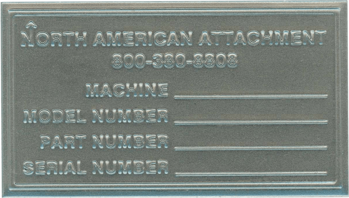 This durable metal nameplate prominently features the company name "North American Attachment," with the text and contact number ("800-380-8808") embossed for lasting readability. The plate includes designated blank lines to record important equipment details, specifically labeled for "MACHINE," "MODEL NUMBER," "PART NUMBER," and "SERIAL NUMBER." The sturdy design ensures critical identification information remains accessible on industrial machinery or equipment.
